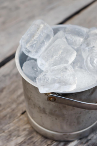 Ice cubes in metal bucket: Richmond’s Air AC Repair Blog